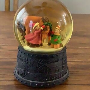 Charming Holiday Snow Globe with Black Base